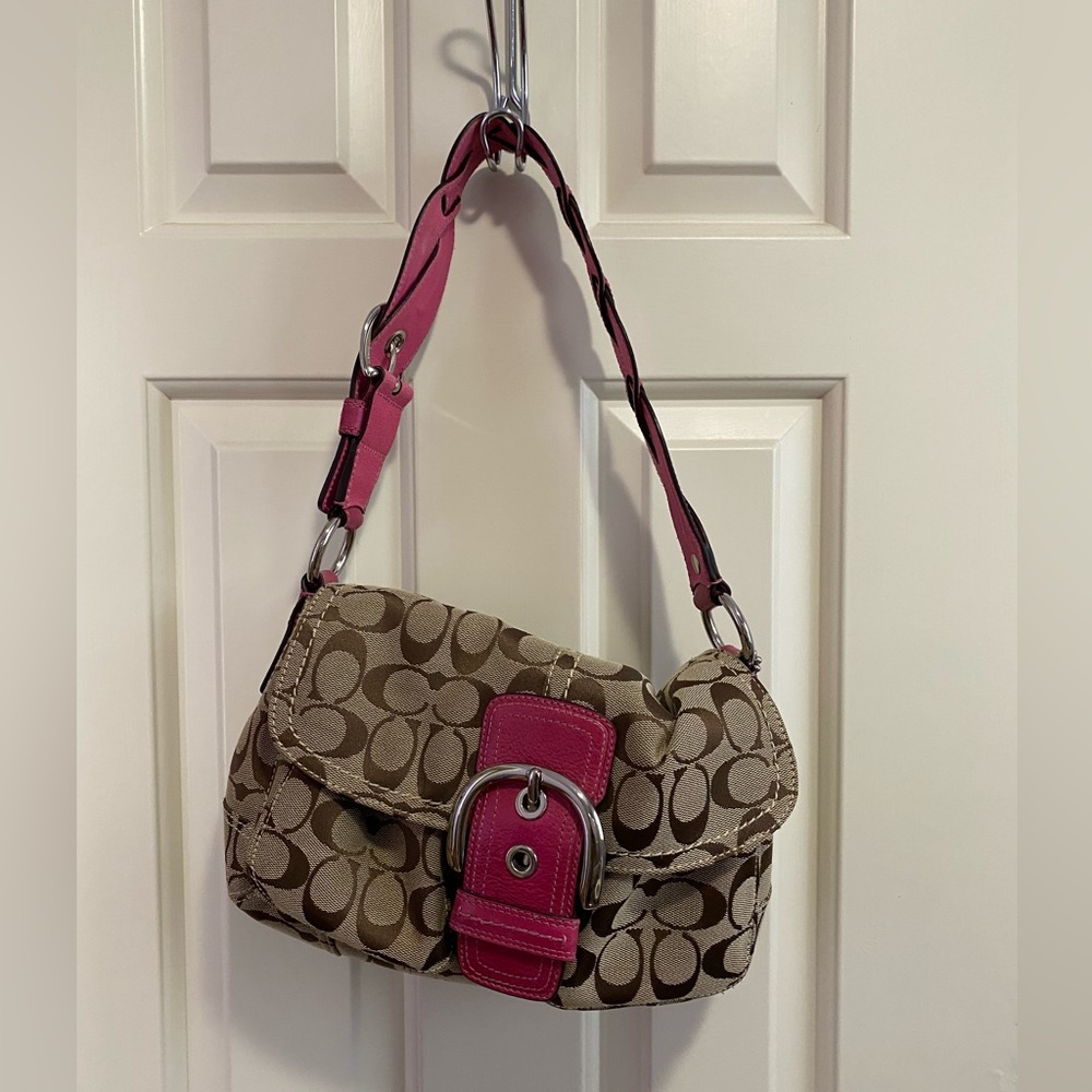 Coach signature bag with pink braided strap